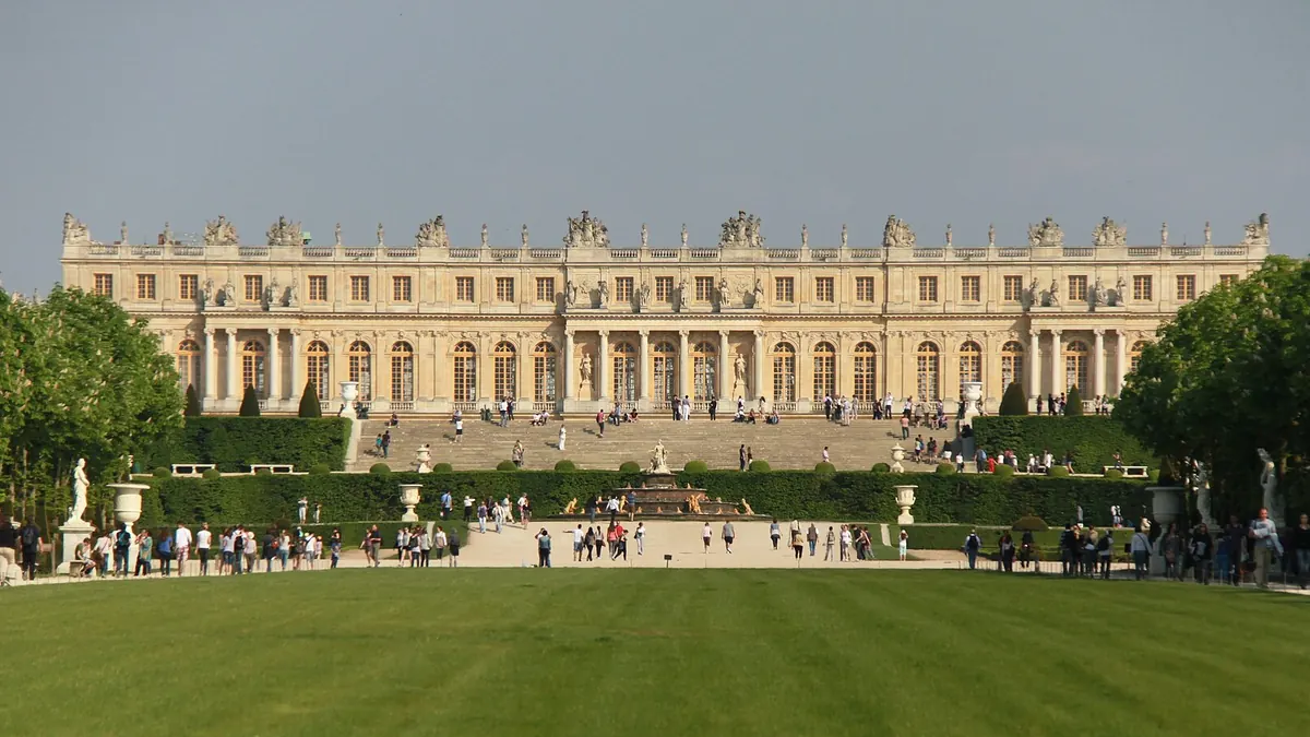 Garden facade of the Palace of Versailles with formal gardens in Ile-de-France, France