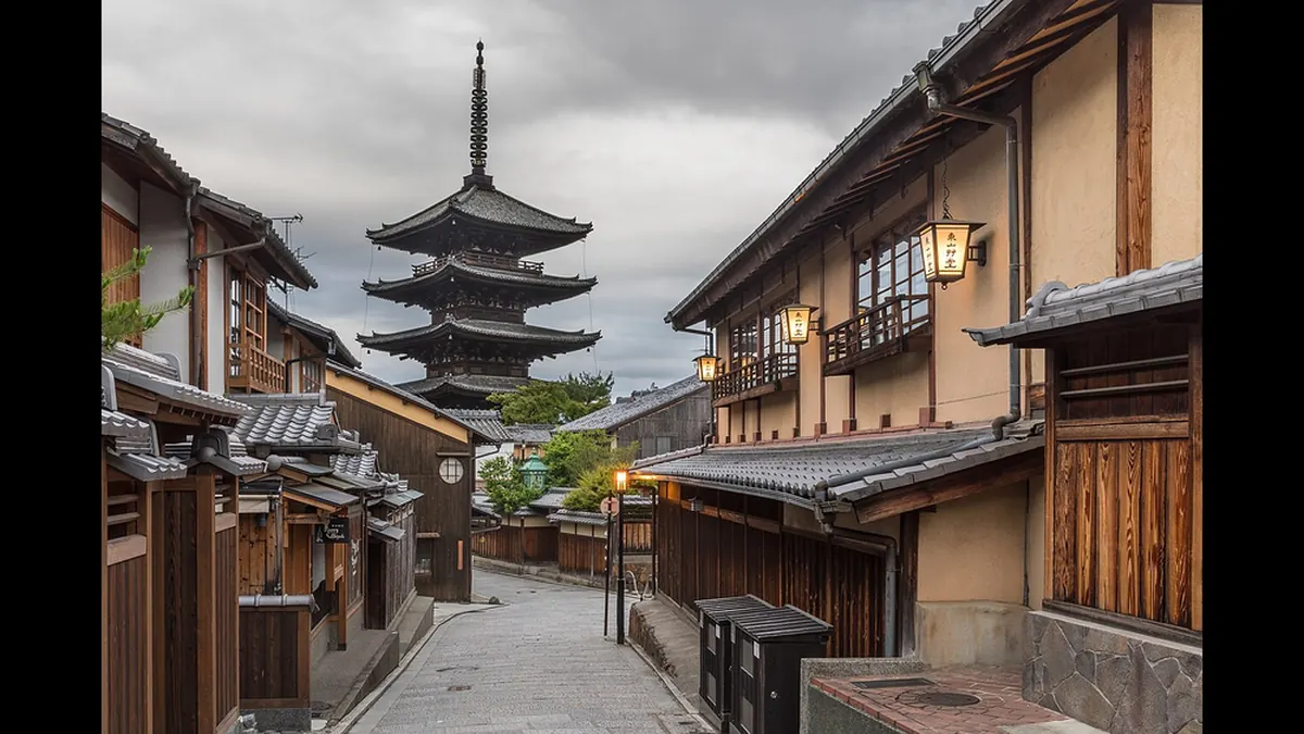Yasaka-dori street in Kyoto in the early morning with street lanterns and the Tower of Yasaka at Hokan-ji Temple on a summer day