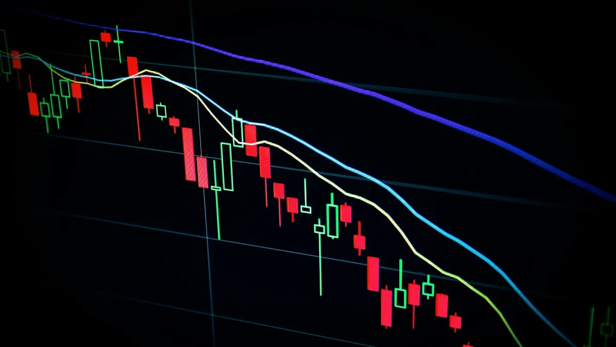 Trading screens showing market charts and data, representing active crypto hedge fund trading