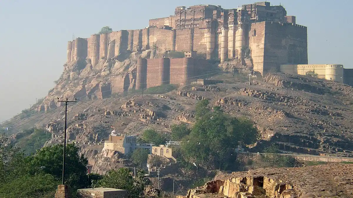 Mehrangarh Fort rising above the blue houses of Jodhpur old city in Rajasthan