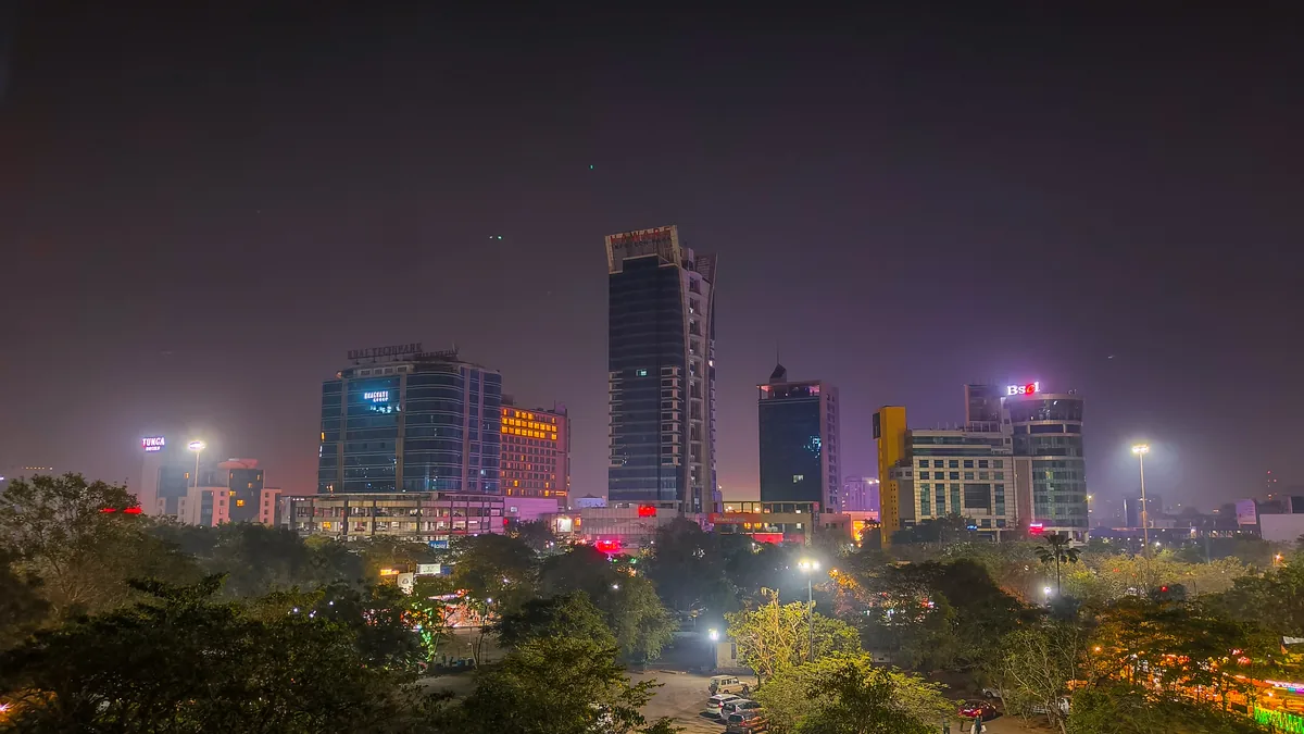 Vashi skyline in Navi Mumbai seen across Raghuleela Mall, with high-rise buildings above the planned streets of Vashi