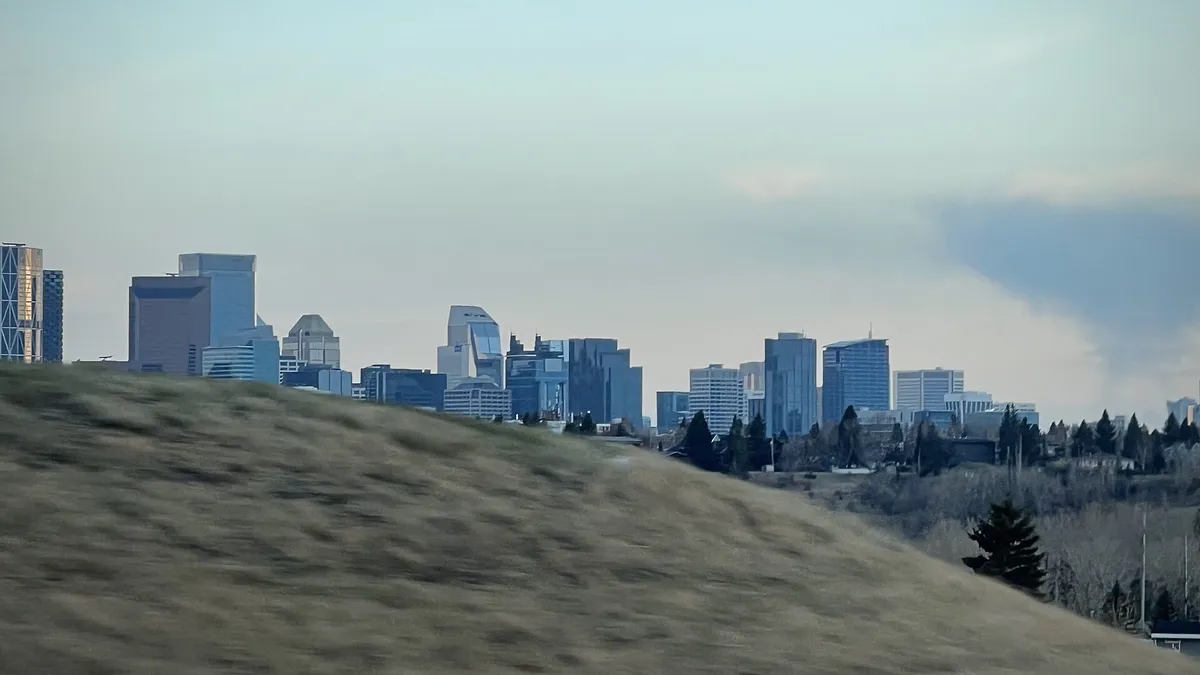 Calgary skyline at dusk representing IT firms measuring digital marketing ROI in Calgary, Canada