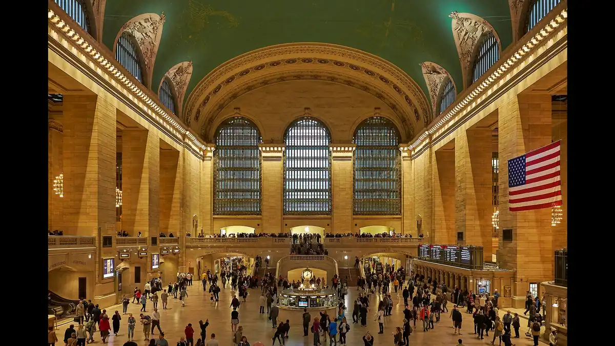 Travellers crossing the grand main concourse of Grand Central Terminal in New York, home of the hidden Whispering Gallery