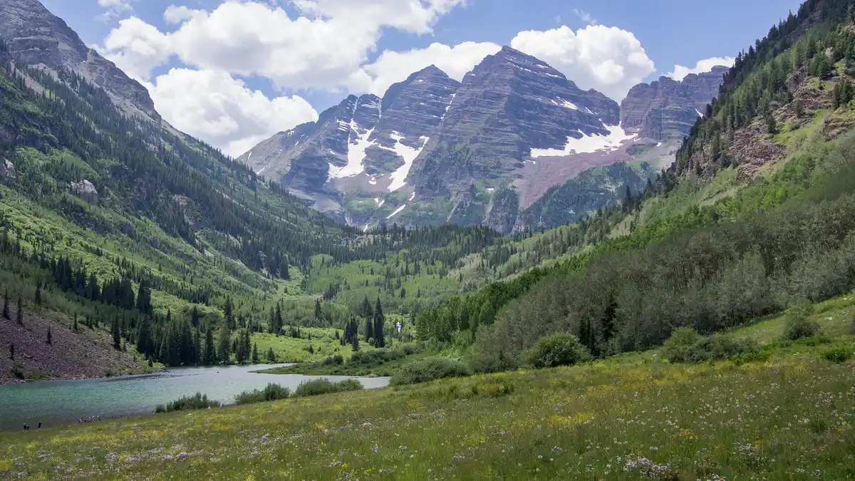 Maroon Bells peaks reflected in Maroon Lake near Aspen, Colorado in summer