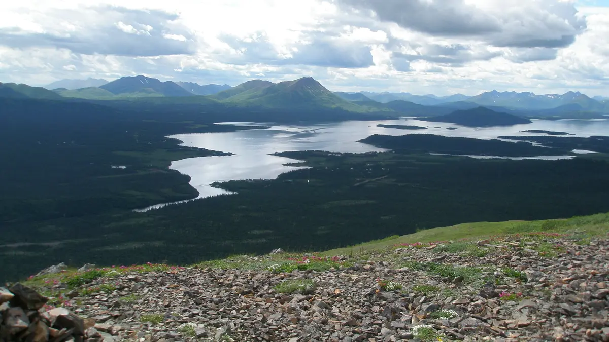 Lake Aleknagik in southwest Alaska with the village of Aleknagik visible on the shore, illustrating remote community life near Bristol Bay