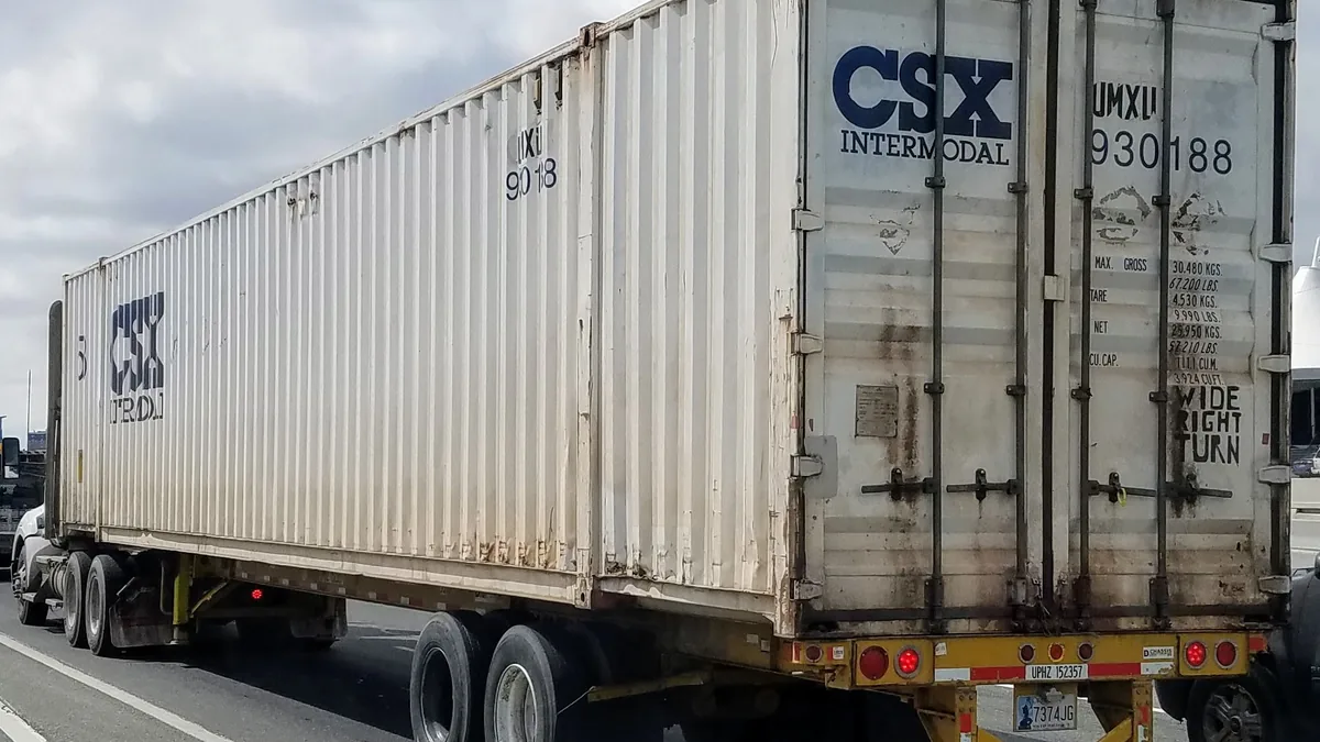 Intermodal container loaded on a truck trailer at a rail yard in Denver, Colorado