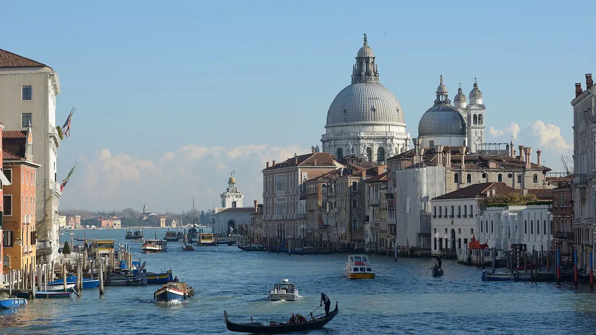 Gondolas on the Grand Canal in Venice, Italy, with the Church of Santa Maria della Salute across the water